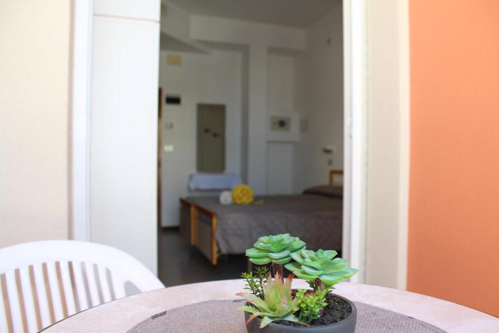 Postel nebo postele na pokoji v ubytování Hotel Caesar