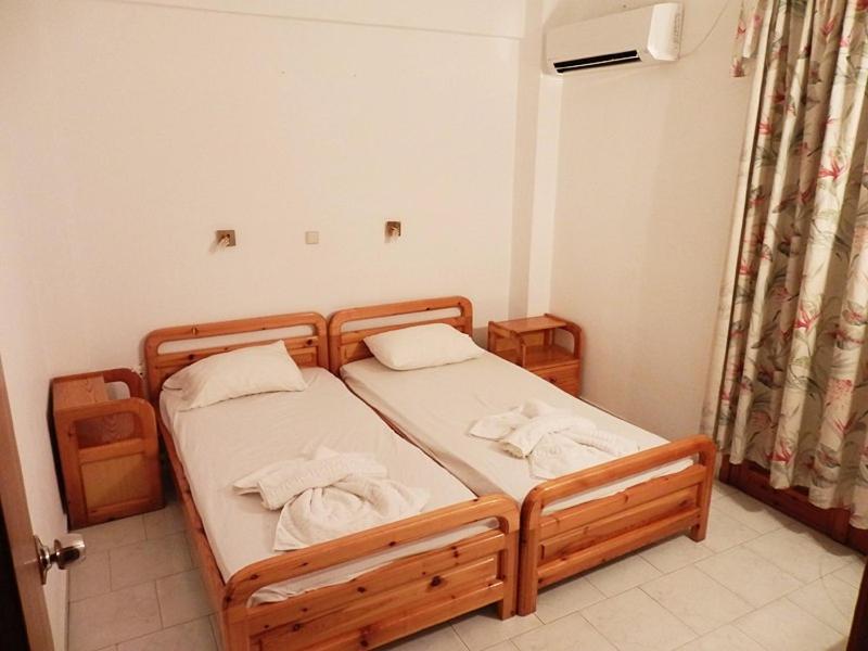 Postel nebo postele na pokoji v ubytování Sea Stone Apartments
