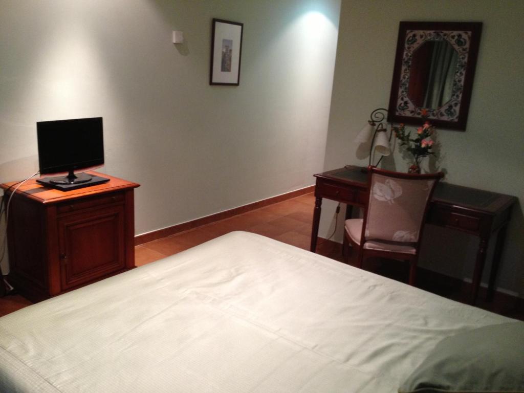 TV a/nebo společenská místnost v ubytování Hotel Esther