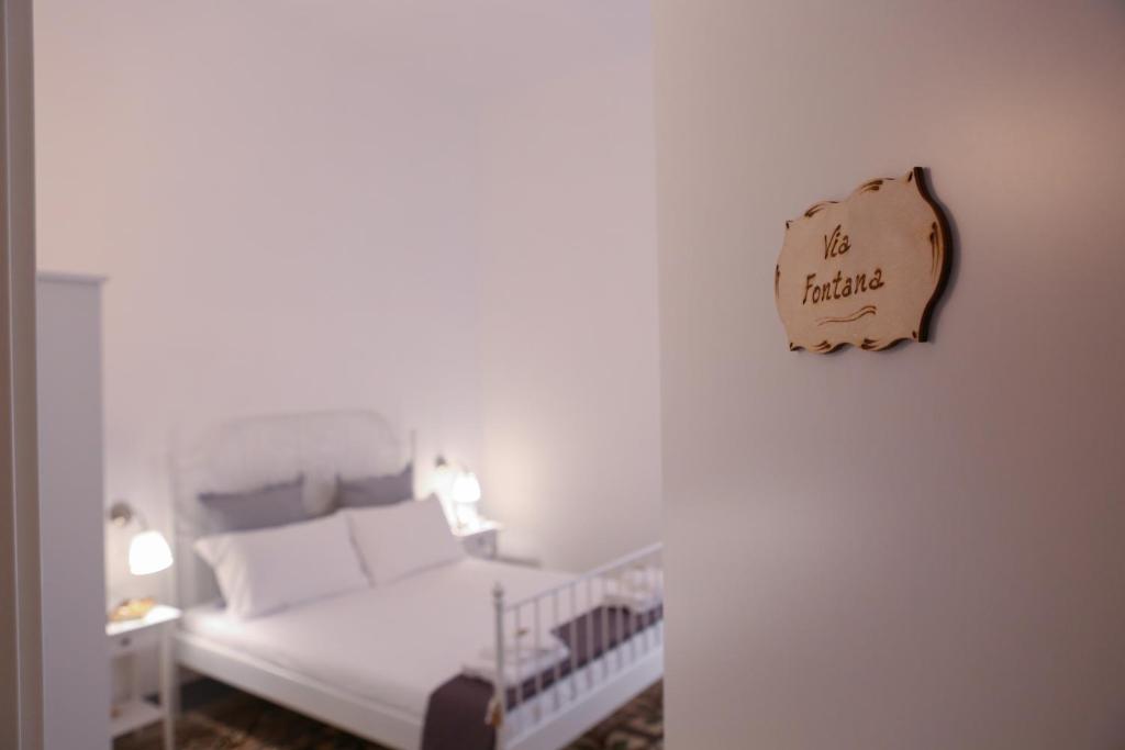 Postel nebo postele na pokoji v ubytování Borgottocento