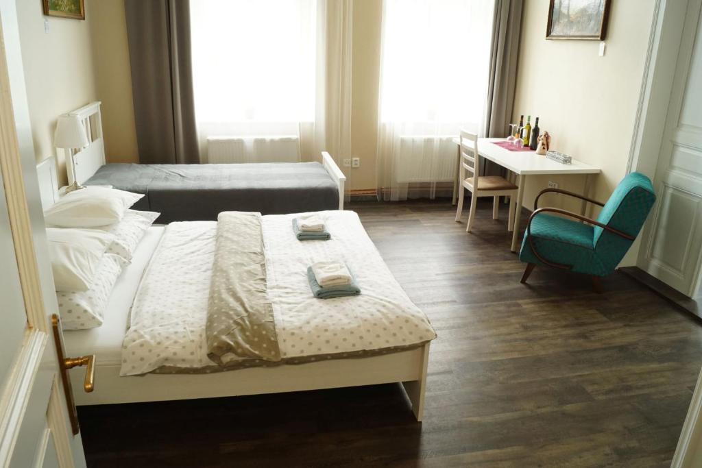 Postel nebo postele na pokoji v ubytování Apartmány Mary