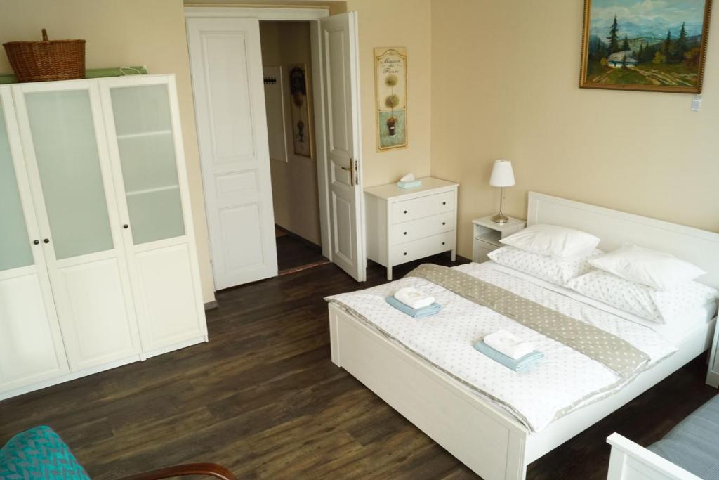 Postel nebo postele na pokoji v ubytování Apartmány Mary