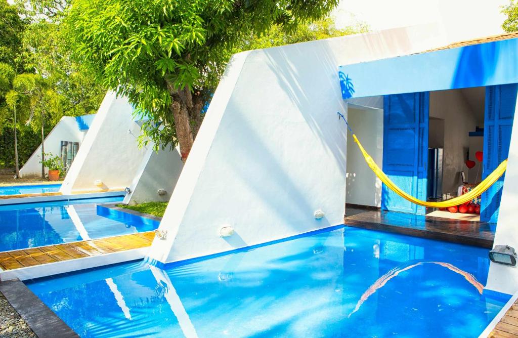 Bazén v ubytování Hotel y Spa Santa Fe Colonial nebo v jeho okolí