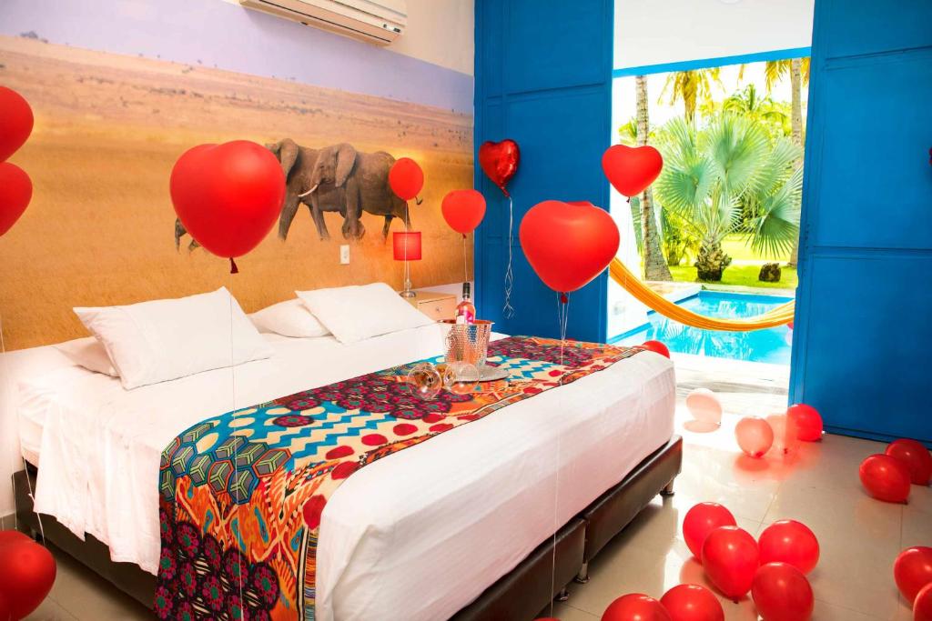 Postel nebo postele na pokoji v ubytování Hotel y Spa Santa Fe Colonial