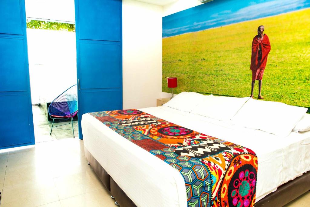 Postel nebo postele na pokoji v ubytování Hotel y Spa Santa Fe Colonial