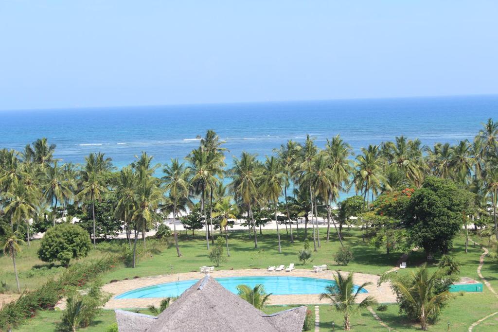 Gambar di galeri bagi Golden Beach Resort A051 di Diani Beach