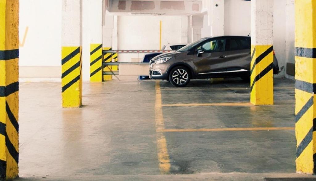 a car parked in an empty parking garage at Napoleon in Ajaccio