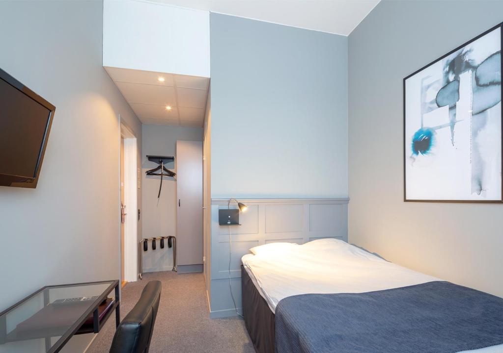 Postel nebo postele na pokoji v ubytování Hotell Leksand