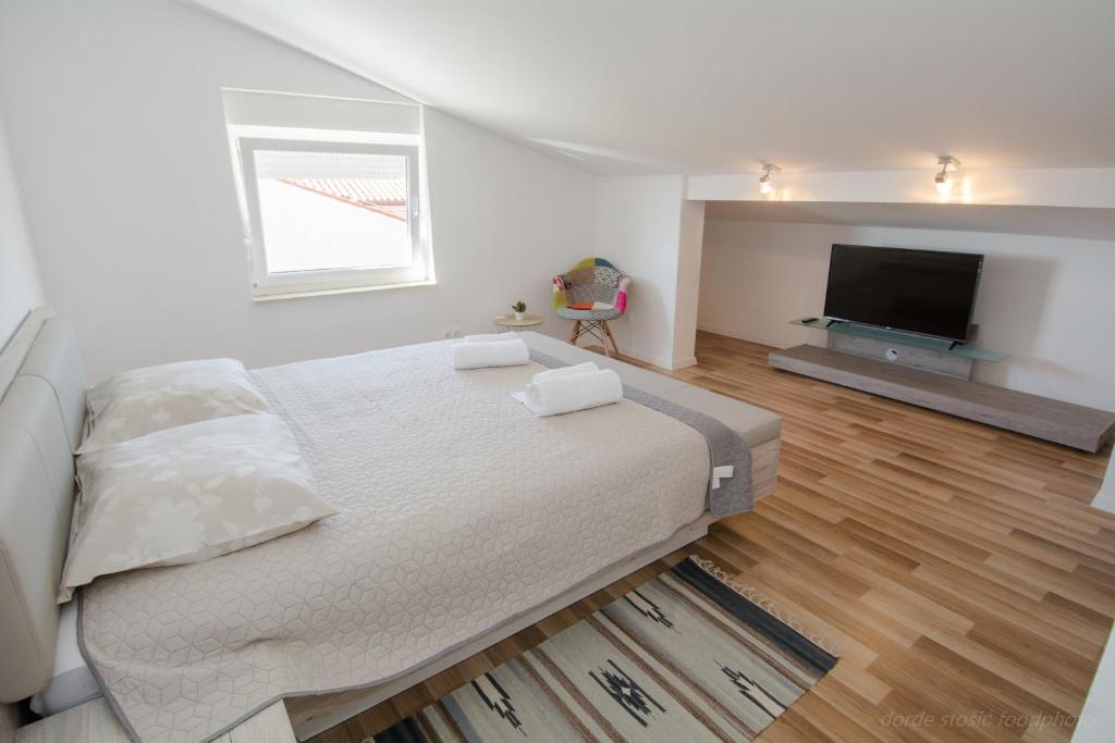 Posteľ alebo postele v izbe v ubytovaní Apartment AleMar