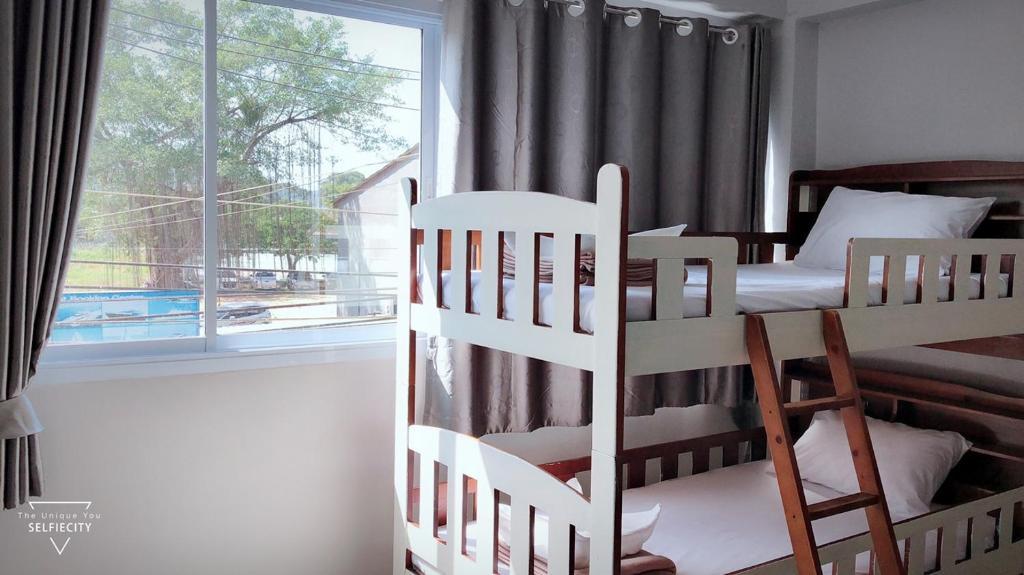 Postel nebo postele na pokoji v ubytování Ler Hostel 65