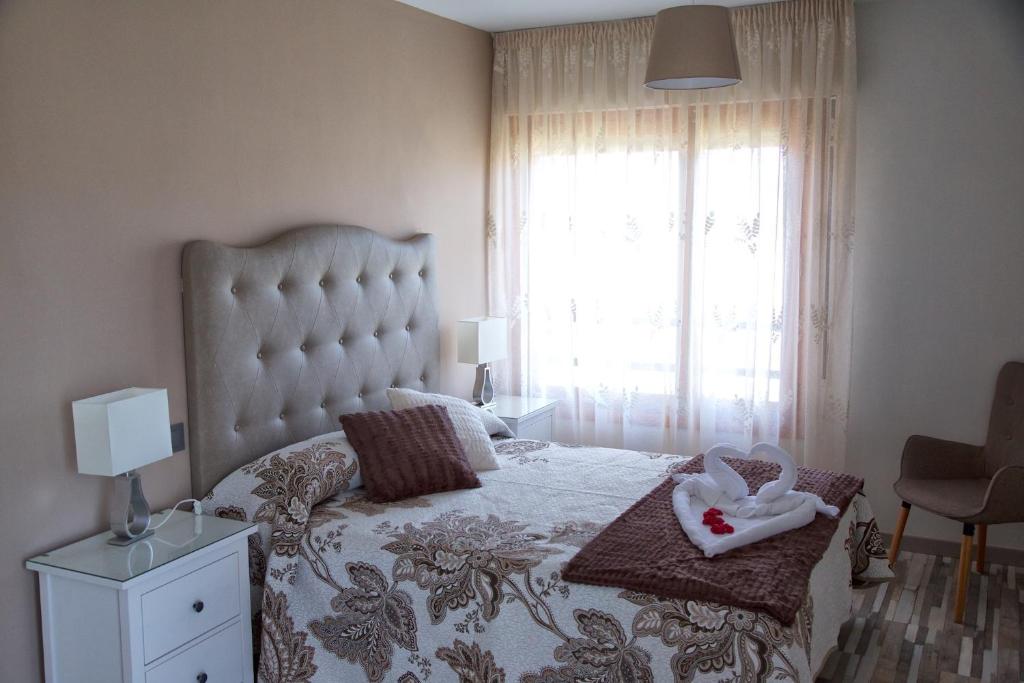 Postel nebo postele na pokoji v ubytování Villa Castro