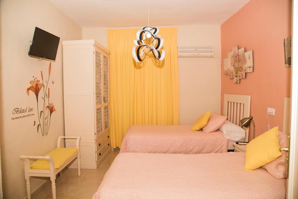 Cama o camas de una habitación en Pension Internacional