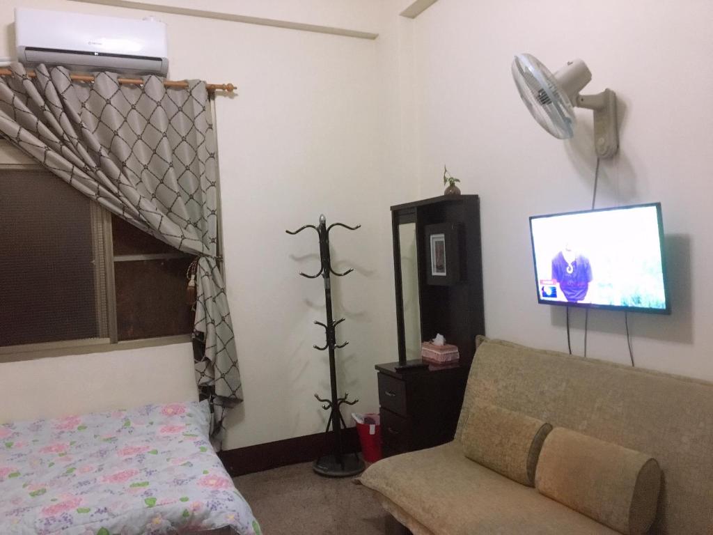 TV a/nebo společenská místnost v ubytování Dongguang Zhixing Homestay