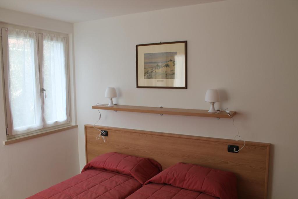Postel nebo postele na pokoji v ubytování B&B Lil