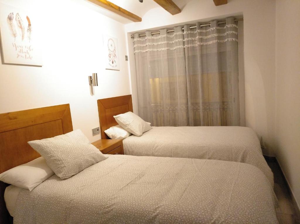 Posteľ alebo postele v izbe v ubytovaní apartamento las torres-botanico con 2 habitaciones