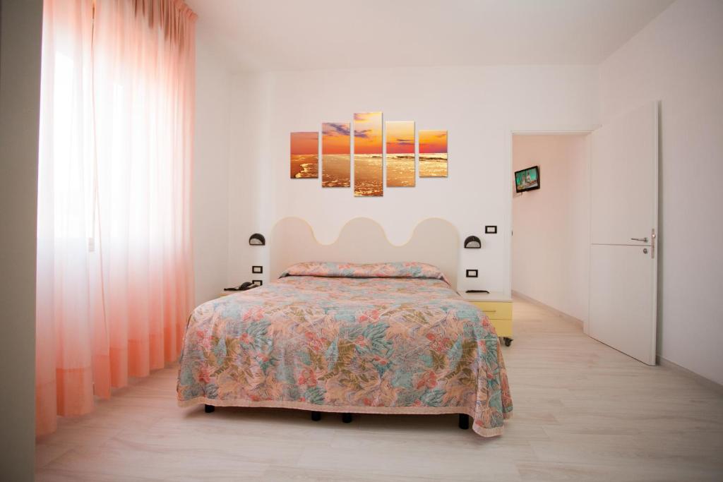 Postel nebo postele na pokoji v ubytování Hotel Belvedere