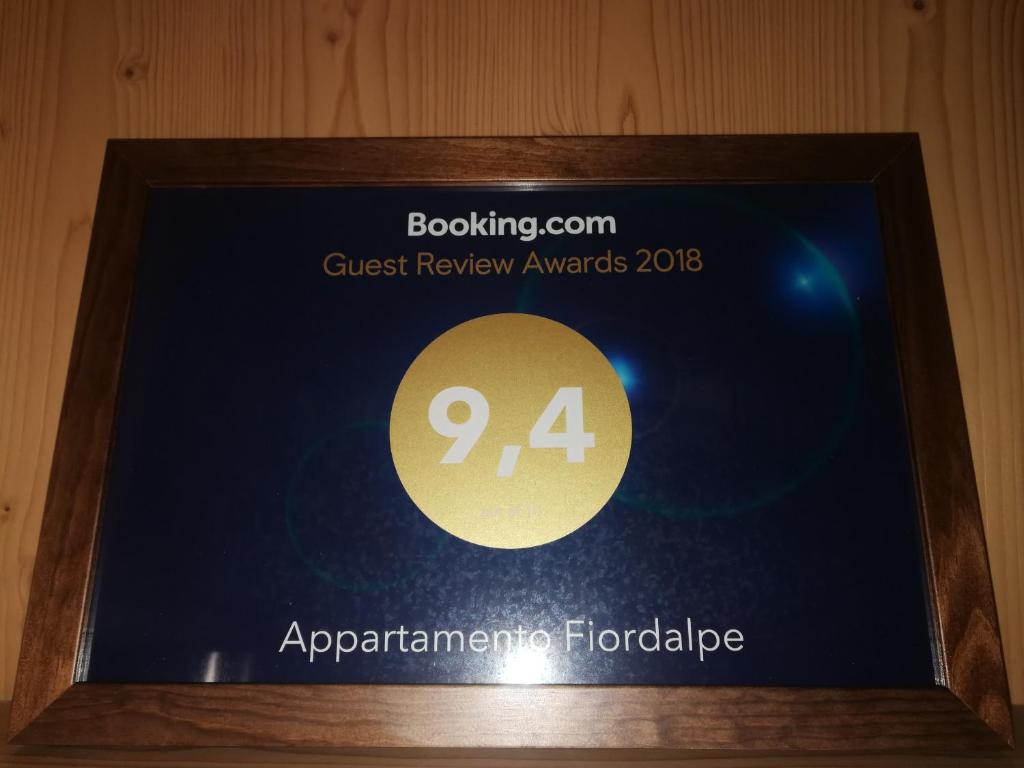 Certyfikat, podpis lub inny dokument wystawiony w obiekcie Appartamento Fiordalpe