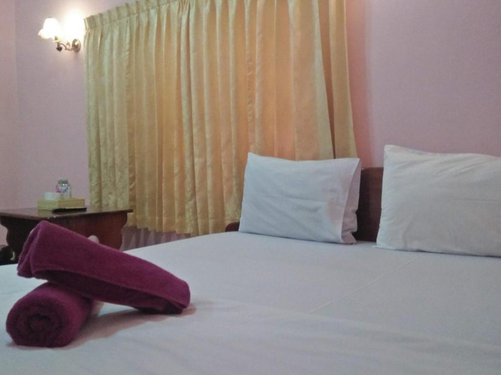 Postel nebo postele na pokoji v ubytování Sam So Guesthouse