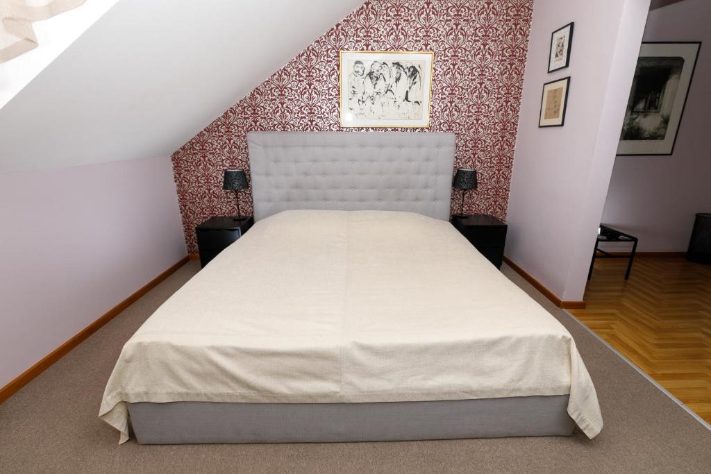 Postel nebo postele na pokoji v ubytování Art Garni Hotel