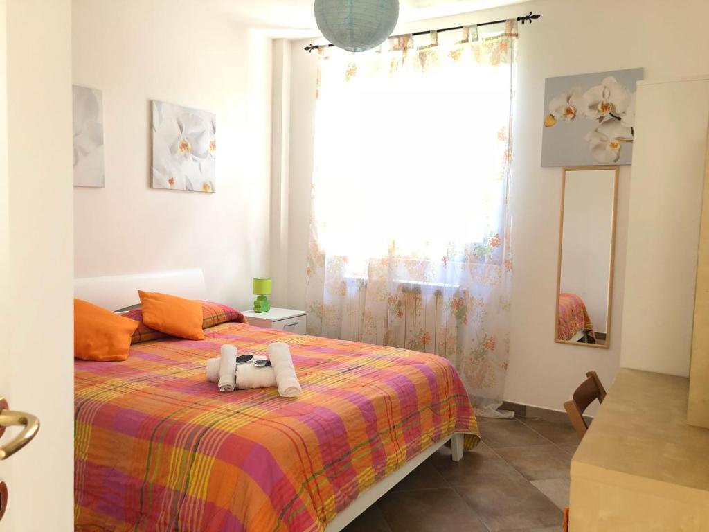 Łóżko lub łóżka w pokoju w obiekcie Miluna B&B