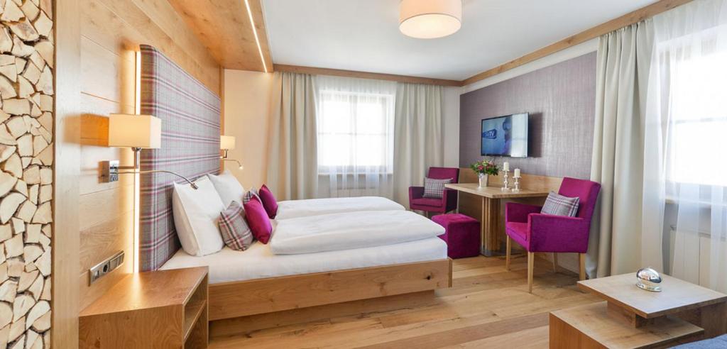 Postel nebo postele na pokoji v ubytování Hotel Bianca