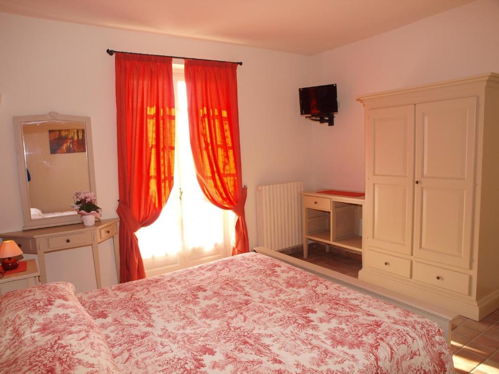 Posteľ alebo postele v izbe v ubytovaní Agriturismo Sette Colli