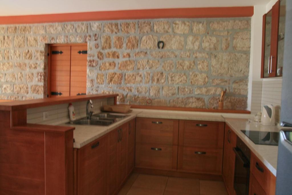 Kuchyň nebo kuchyňský kout v ubytování Apartments Villa Čučuk