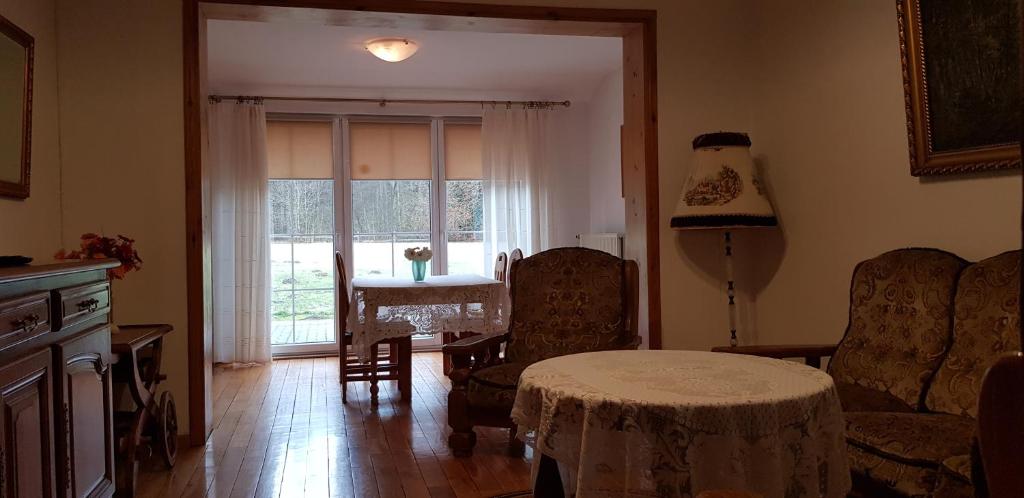 Kuchyňa alebo kuchynka v ubytovaní Apartamenty Drewniany Dom