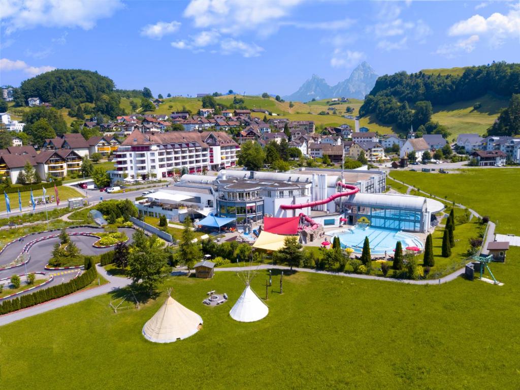 an aerial view of a city with a resort at Swiss Holiday Park Resort in Morschach
