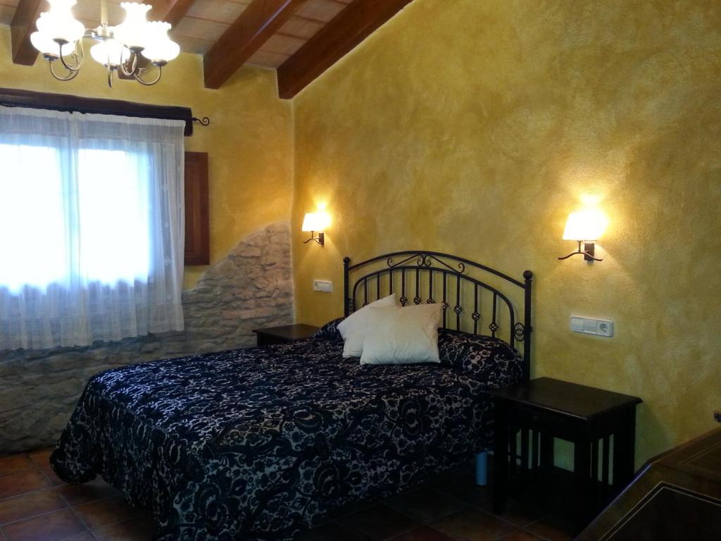 Posteľ alebo postele v izbe v ubytovaní Country House El Permanyer