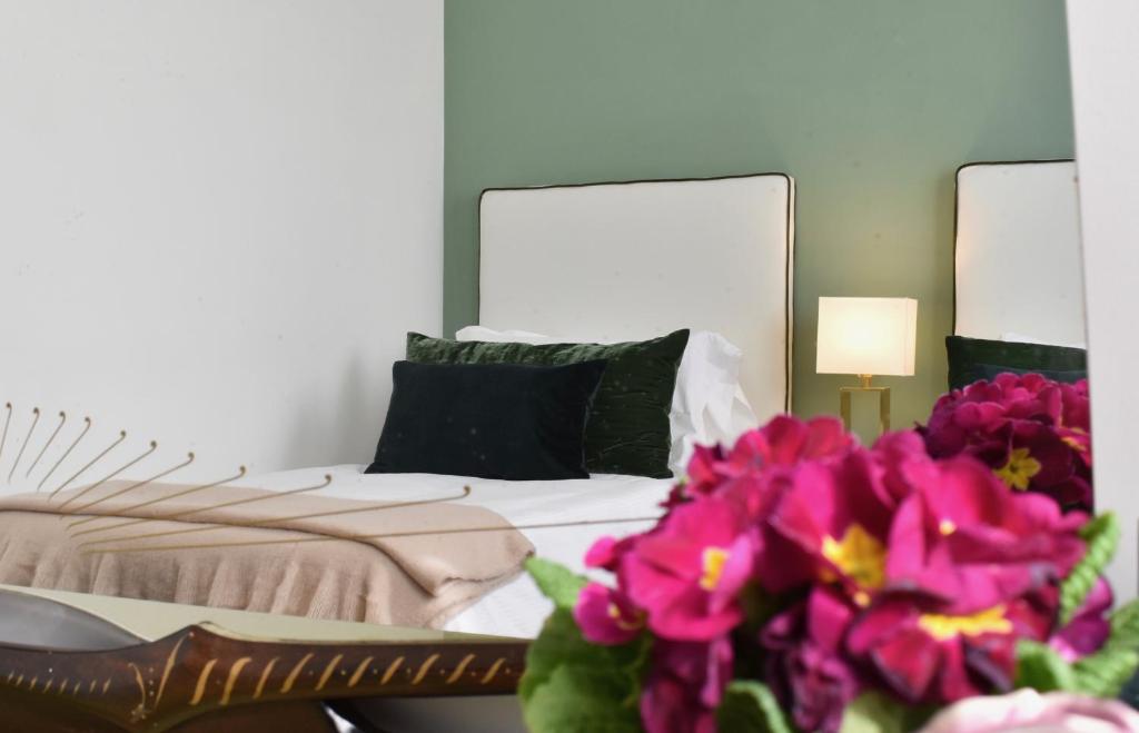 Postel nebo postele na pokoji v ubytování Palazzina Mori - Luxury B&B