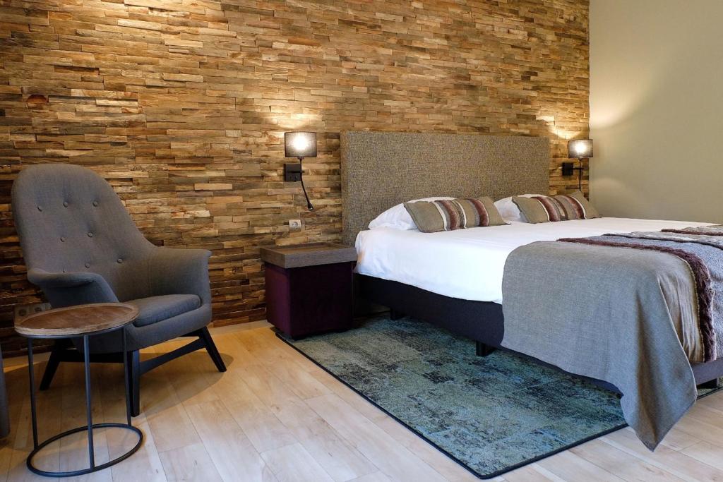 Postel nebo postele na pokoji v ubytování Landgoedhotel Woodbrooke Barchem