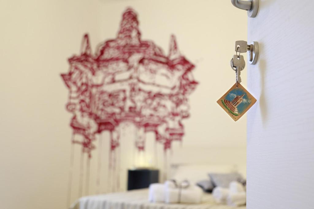 Postel nebo postele na pokoji v ubytování B&B EVO Nardò
