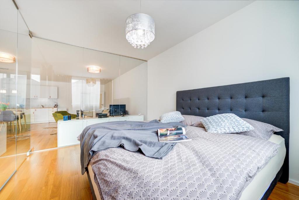 Postel nebo postele na pokoji v ubytování Mill Apartments