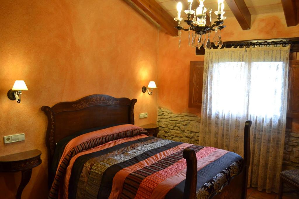 Posteľ alebo postele v izbe v ubytovaní Country House El Permanyer