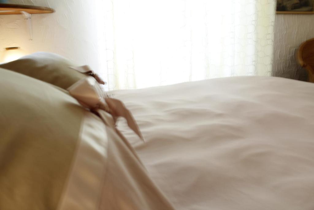 A bed or beds in a room at Punto Relax