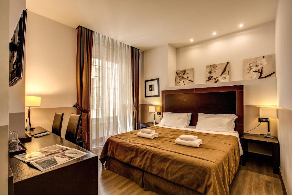 Uma cama ou camas num quarto em Hotel Boutique Nazionale