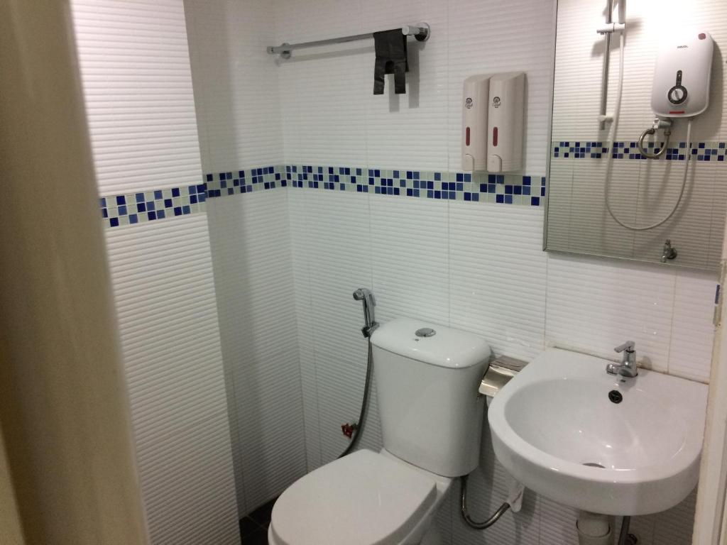 Vannituba majutusasutuses Api-Api GuestHouse