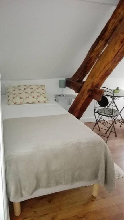 Postel nebo postele na pokoji v ubytování Le Pré Vert
