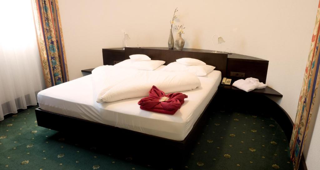 Postel nebo postele na pokoji v ubytování Hotel Montjola Nova
