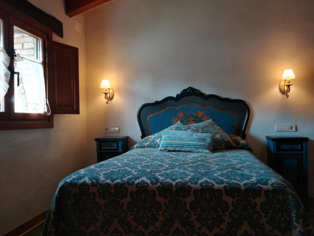 Posteľ alebo postele v izbe v ubytovaní Country House El Permanyer