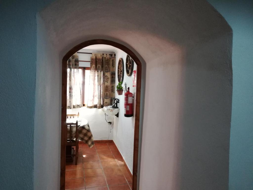 Postel nebo postele na pokoji v ubytování Cueva Tradicional El capricho