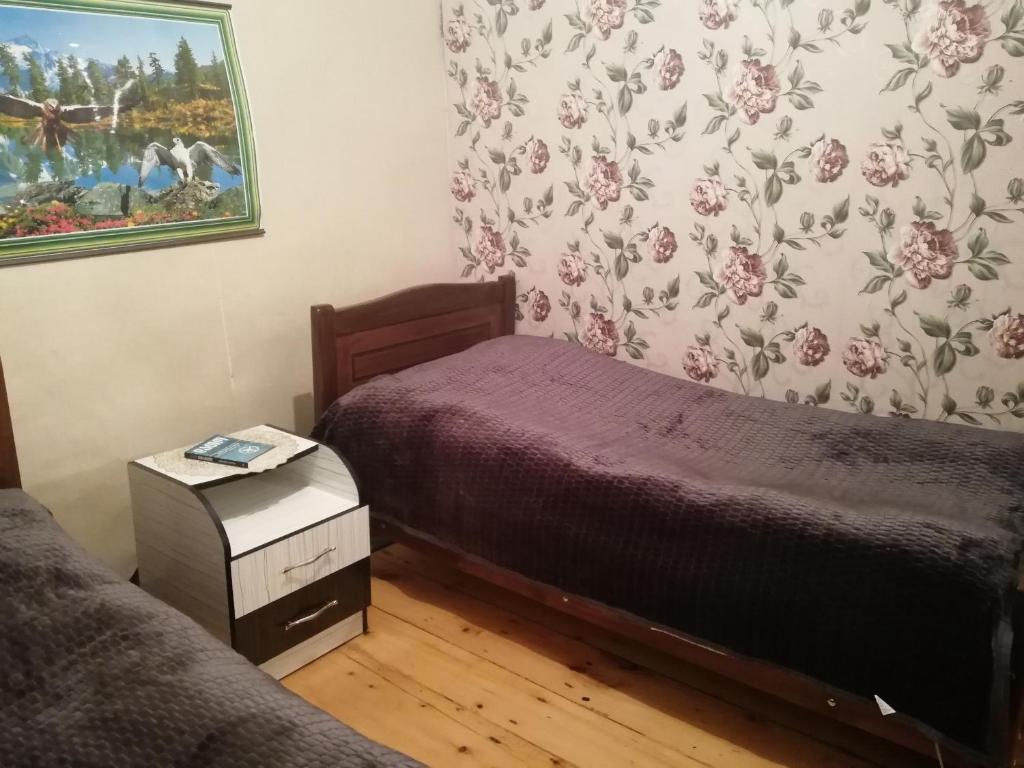 Postel nebo postele na pokoji v ubytování Nora's guesthouse