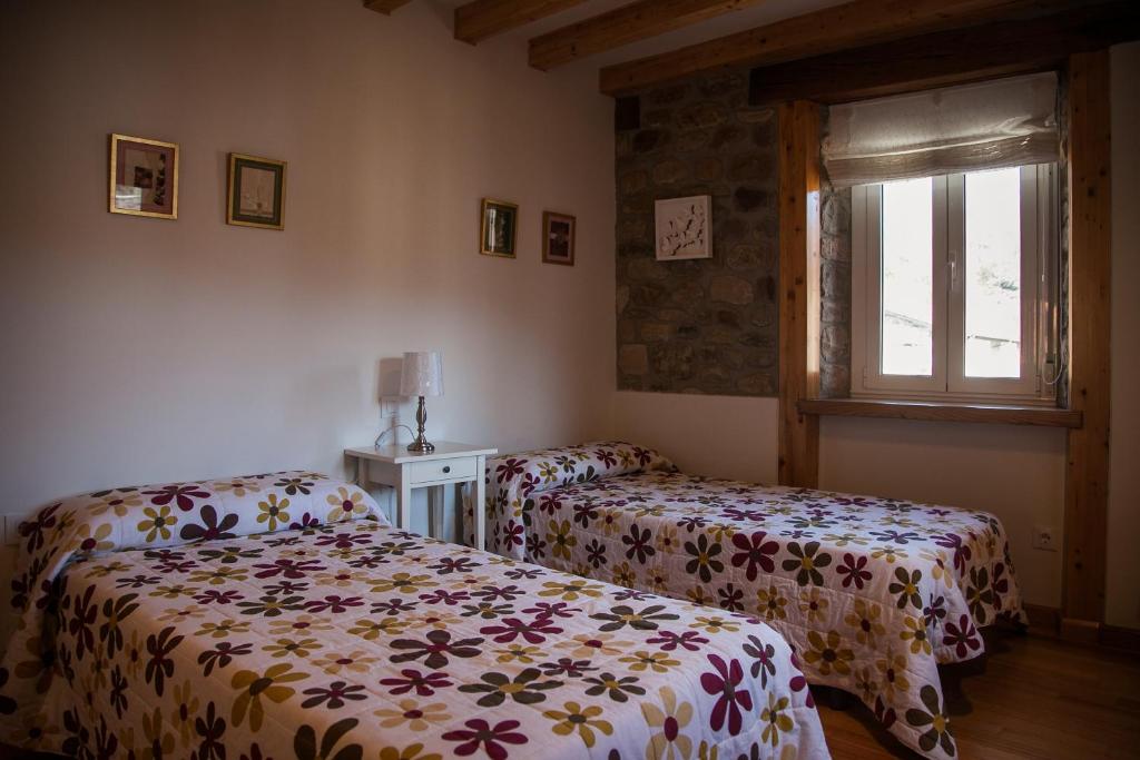 Posteľ alebo postele v izbe v ubytovaní La Casa de Santa Olalla