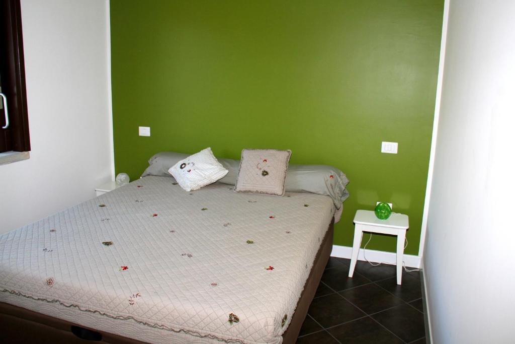 Un pat sau paturi într-o cameră la Villa Antonia Castellabate