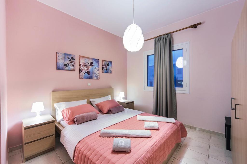 Postel nebo postele na pokoji v ubytování Omega Comfy Apartments