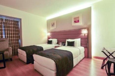 Postel nebo postele na pokoji v ubytování Middleton Inn