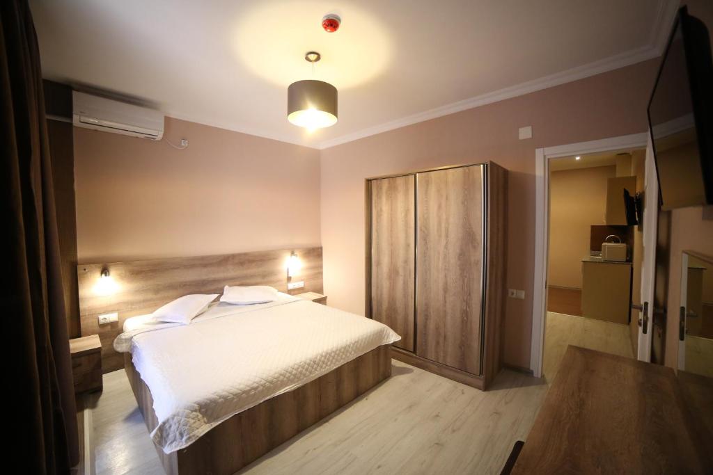 Postel nebo postele na pokoji v ubytování Hotel Soft