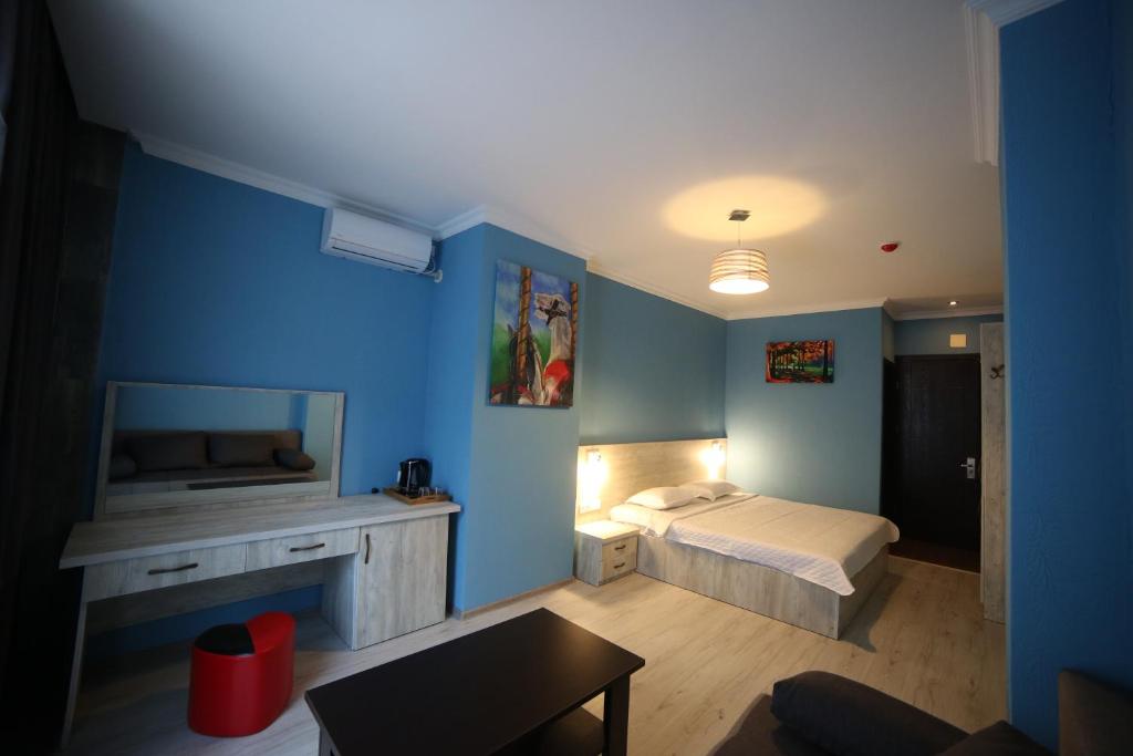 Kuchyň nebo kuchyňský kout v ubytování Hotel Soft