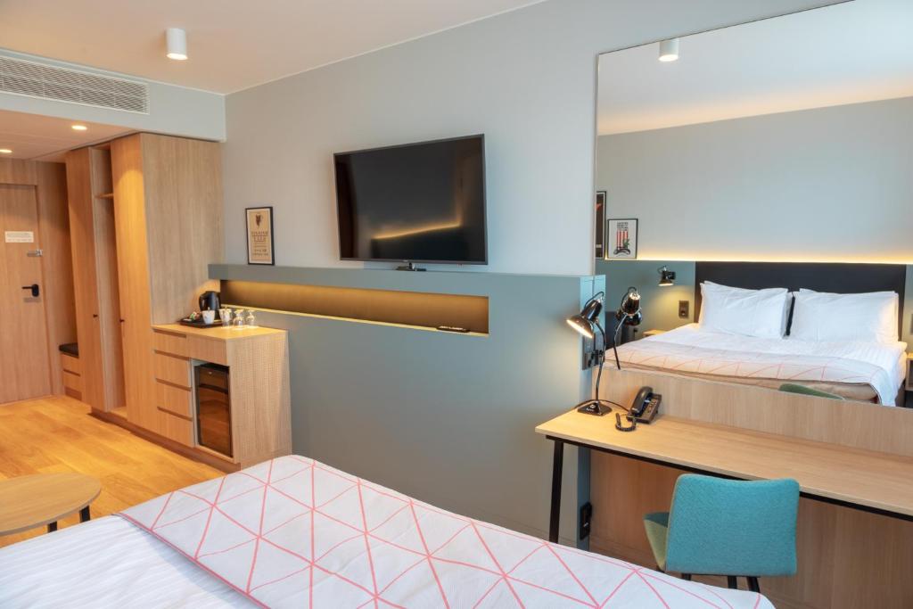 Postel nebo postele na pokoji v ubytování Holiday Inn Helsinki - Expo by IHG